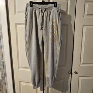 Woman's' Gray Jogger Sweatpants with Gold Accent Pockets. Coco Limon XL